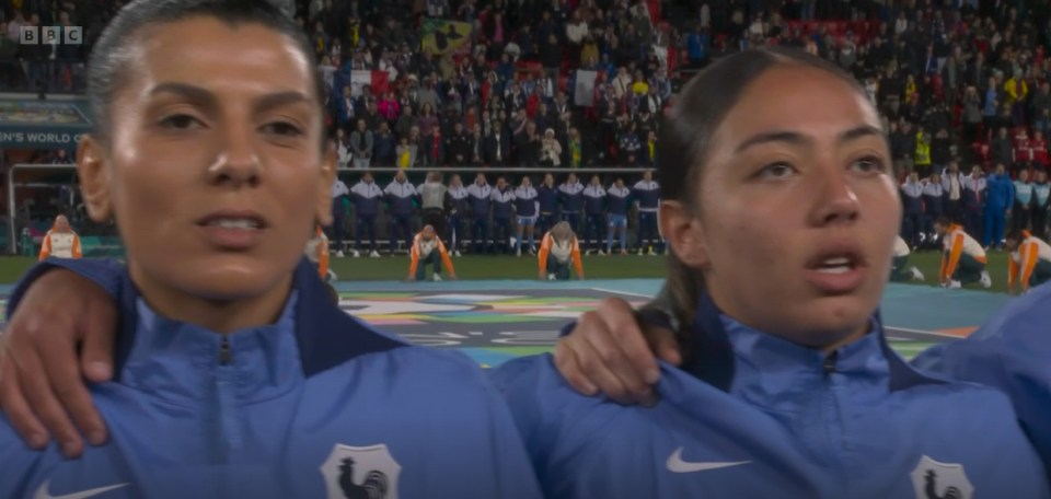 Jonathan Pearce could be heard talking at the start of the French national anthem