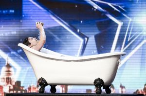 David's attention was distracted when an oiled up hunk turned up in a bath