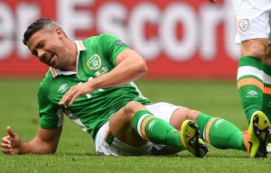 Jon Walters lies injured after aggravating an Achilles injury against Sweden