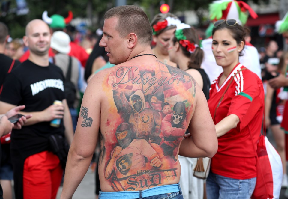 Some fans also wore elaborate body paint such as this Hungary supporter