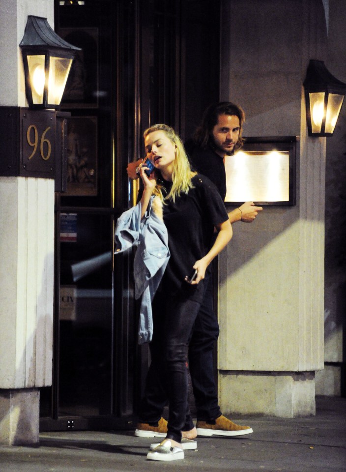She stood outside the venue having what appeared to be a heated conversation