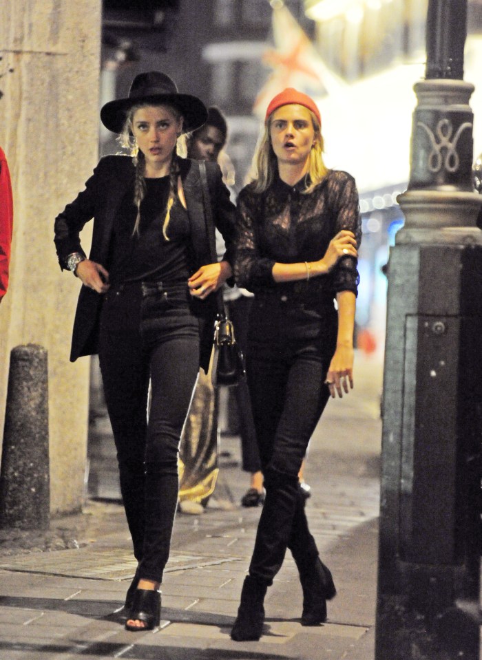 Here comes trouble... Amber and Cara look unimpressed