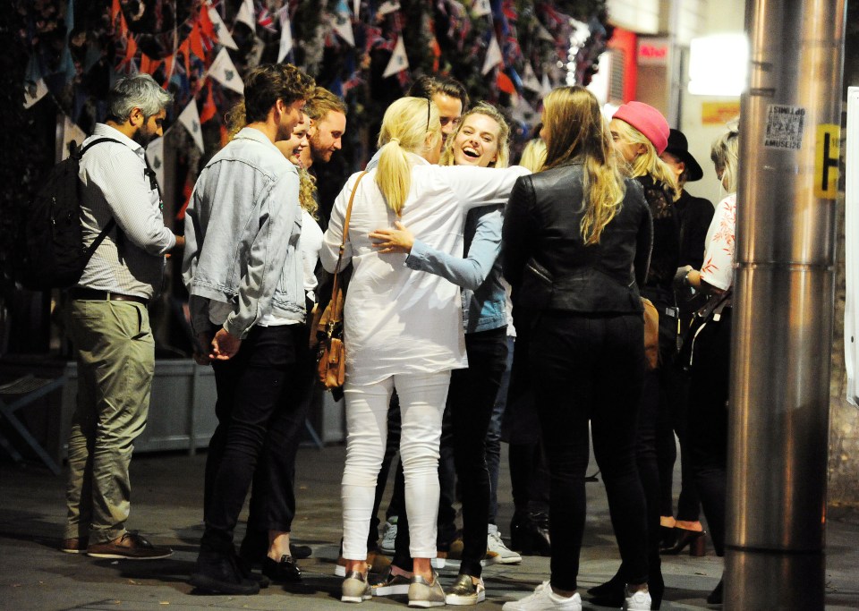 They were seen with a group of friends as they greeted actress Margot Robbie