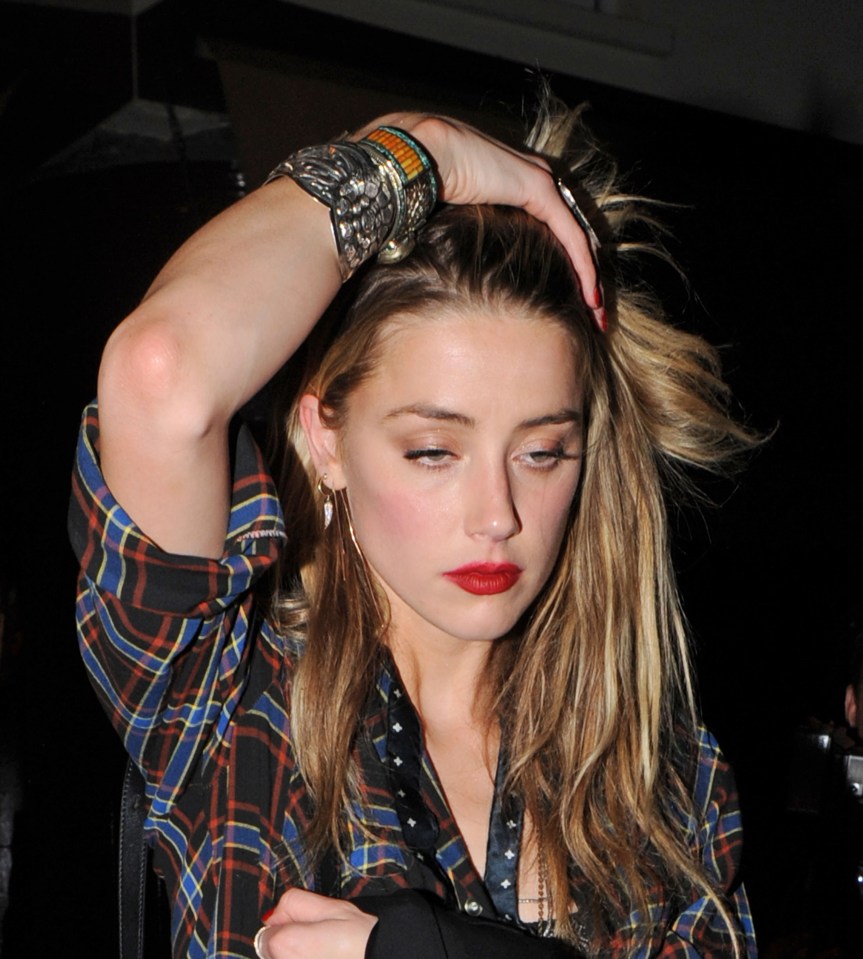 Amber Heard timed her exit perfectly so she wouldn't be pictured with ex-girlfriend Cara Delevingne