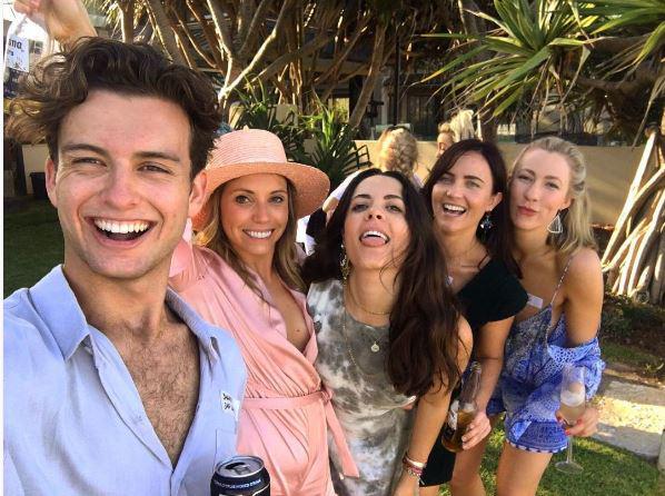 Her brother Cameron Robbie was photographed with her friends at a party, believed to be for the couple
