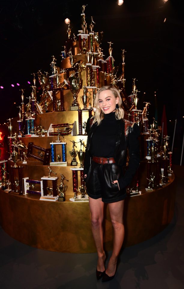  The actress wore a pair of black leather shorts and a polo neck to the event