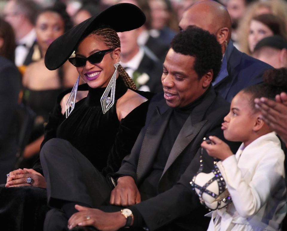 The Carters, aka Beyoncé, Jay-Z and their daughter, Blue Ivy, obviously enjoying themselves at the Grammys