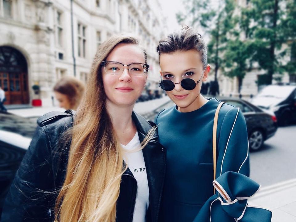 The babysitter has posed with over 500 celebrities over the years, seen here with Stranger Things child actress Millie Bobby Brown
