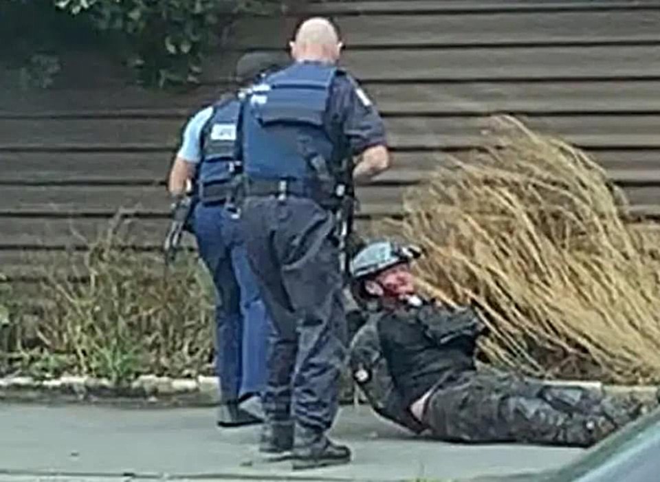 The moment armed cops pounced on Brenton Tarrant was captured, showing the killer wearing his helmet cam