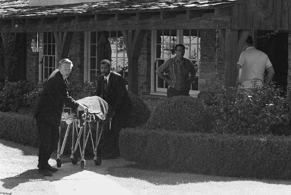  The body of actress Sharon Tate is removed from her Bel Air home in Los Angeles, where she and four others were murdered in 1969