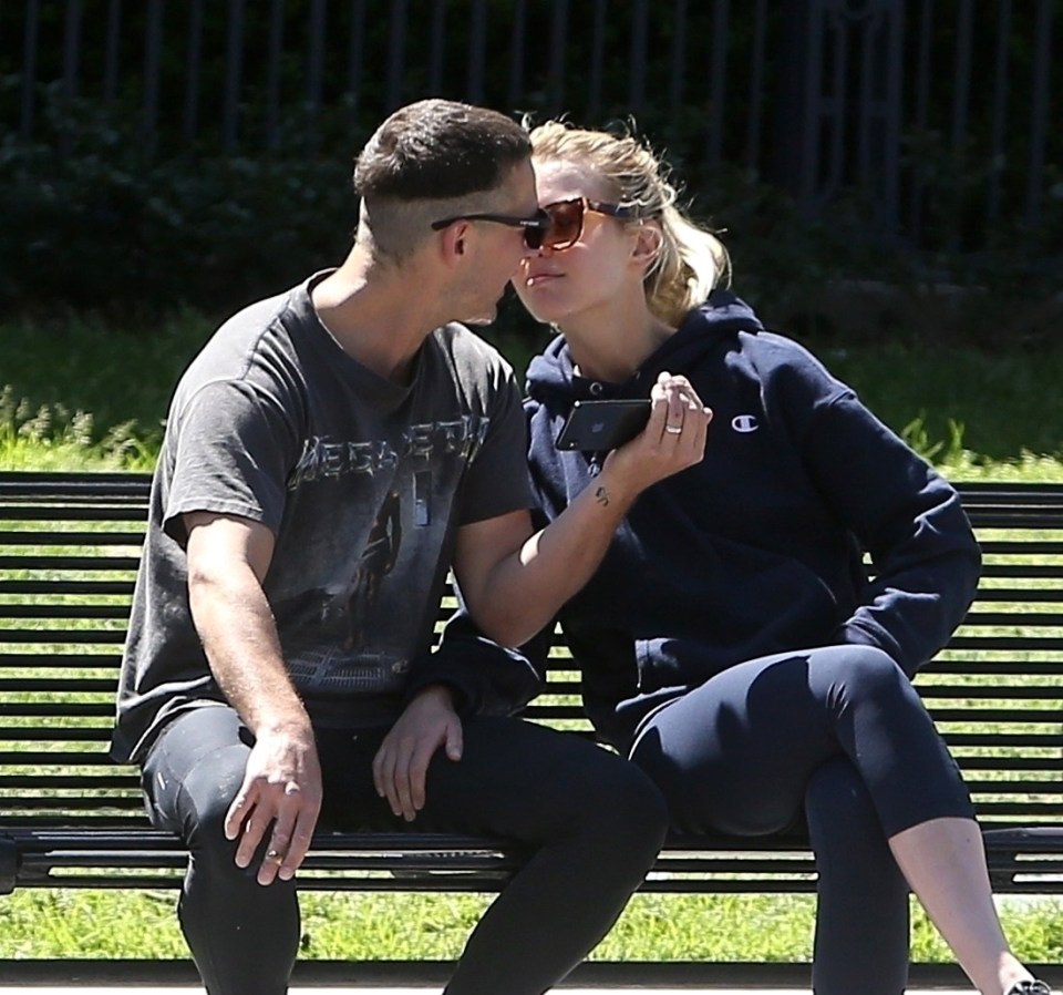  Shia LaBeouf and his estranged wife Mia Goth seen kissing and cuddling on a bench two years after filing for divorce