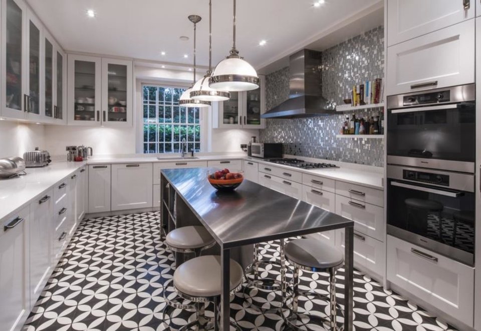 Noel's kitchen is fitted with high-end appliances
