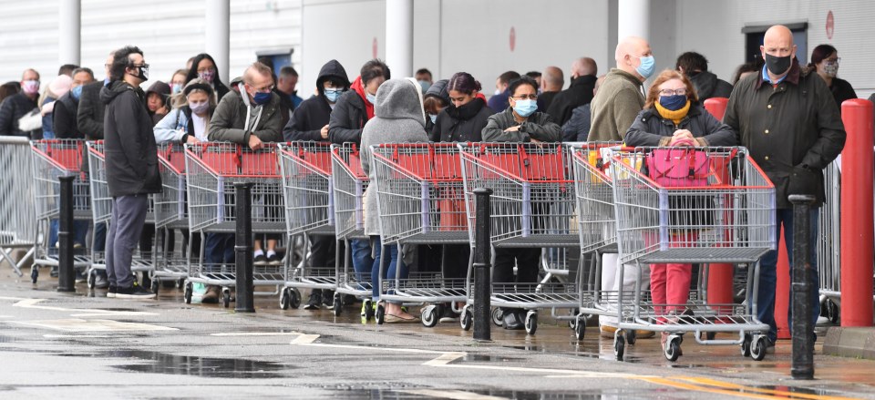 Huge queues were seen outside Costco in Manchester this morning