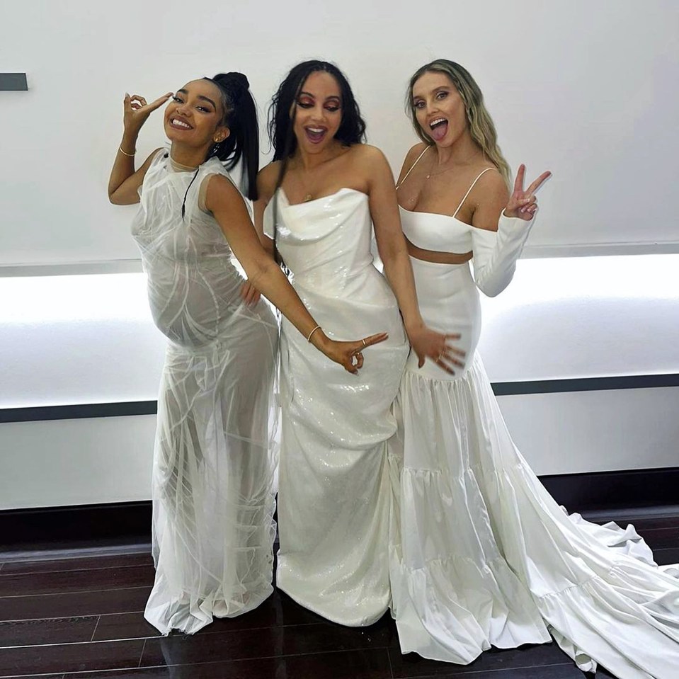 The 28-year-old (centre) usually sports brown locks. Pictured at last month's BRITs with her bandmates