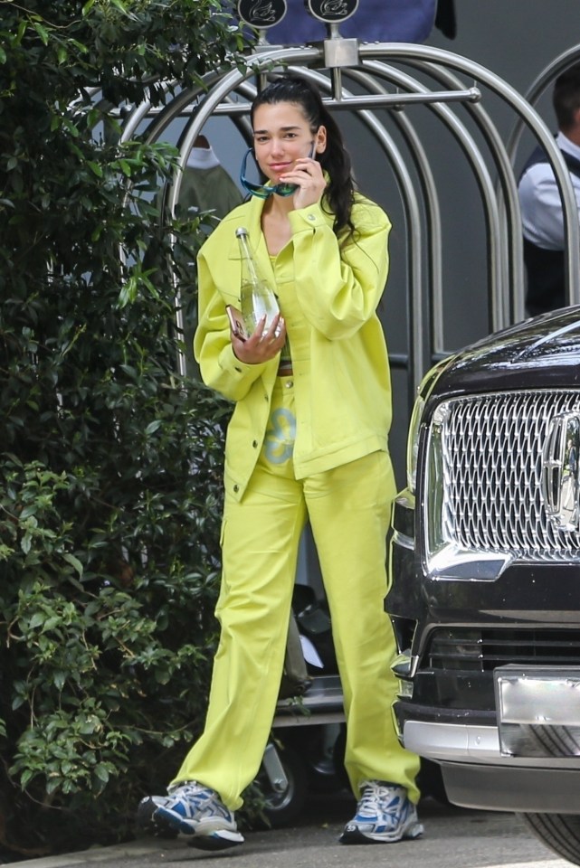 Dua Lipa looked bright and breezy in yellow co-ords as she strolled Hollywood