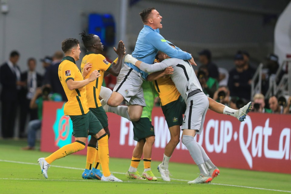 Australian goalkeepers and players rejoice after qualifying for the World Cup.