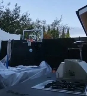 It landed directly into a basketball net on the other side