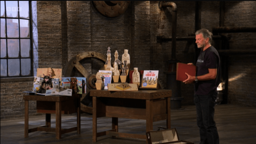 David Hawcock showed the business tycoons his pop up chess set and revealed other paper games are in the pipeline