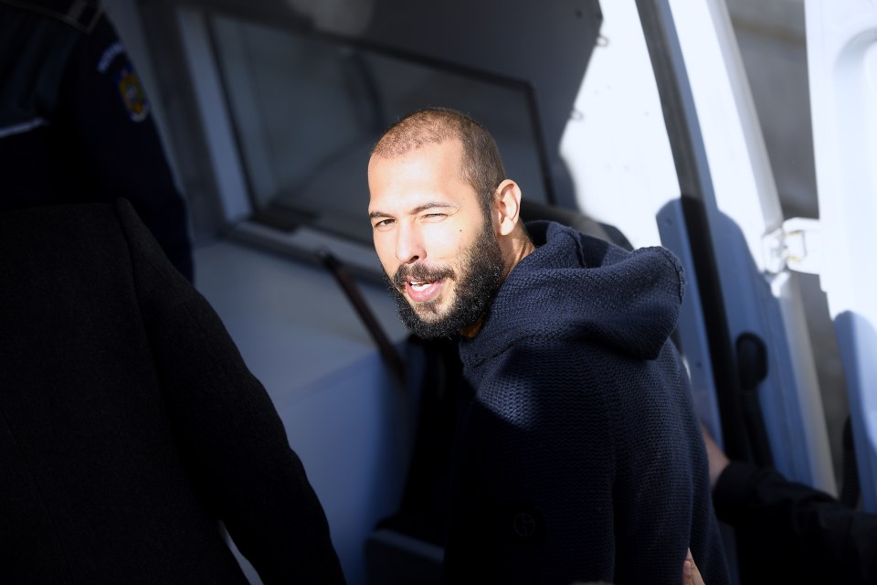 Andrew Tate leaving court after his bid for bail was denied