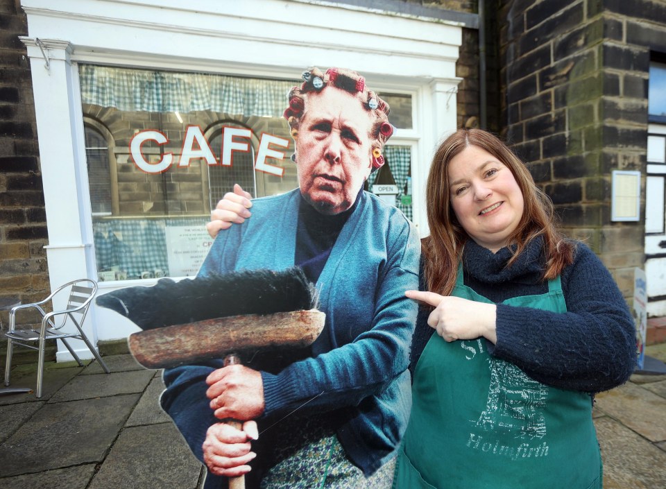 Cafe owner Laura Booth with a cut-out of the show's famous character Nora Batty