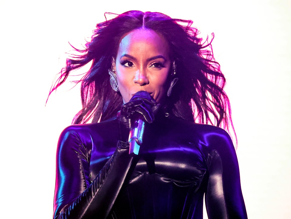 Kelly Rowland looked fierce in this black catsuit as she headlined Mighty Hoopla festival