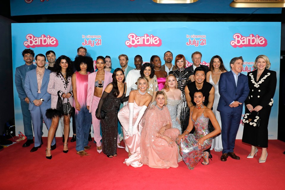 The cast: (L to R) Chris Taylor, Connor Swindells, Hannah Khalique-Brown, Mette Towley, Tom Stourton, Alexandra Shipp, America Ferrera, Sharon Rooney, Margot Robbie, Ryan Gosling, Ncuti Gatwa, Ana Cruz Kayne, Greta Gerwig, Issa Rae, Nicola Coughlan, Jamie Demetriou, Hari Nef, Dua Lipa, Simu Liu, Will Ferrell, Emma Mackey, Rob Brydon and Emerald