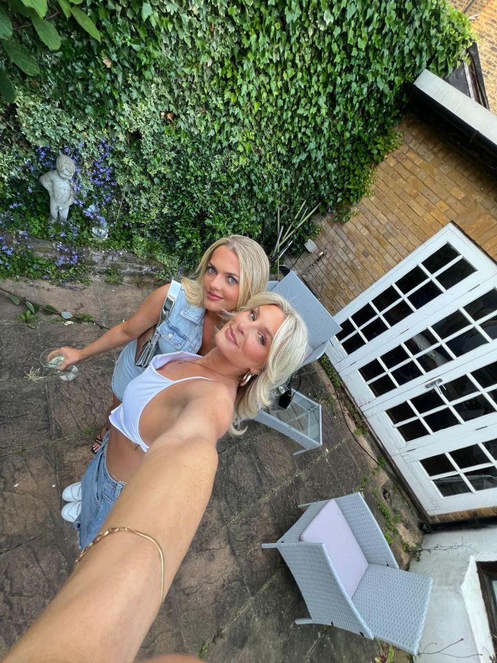 Current tenants Alice Launder and Sam pose in their backyard