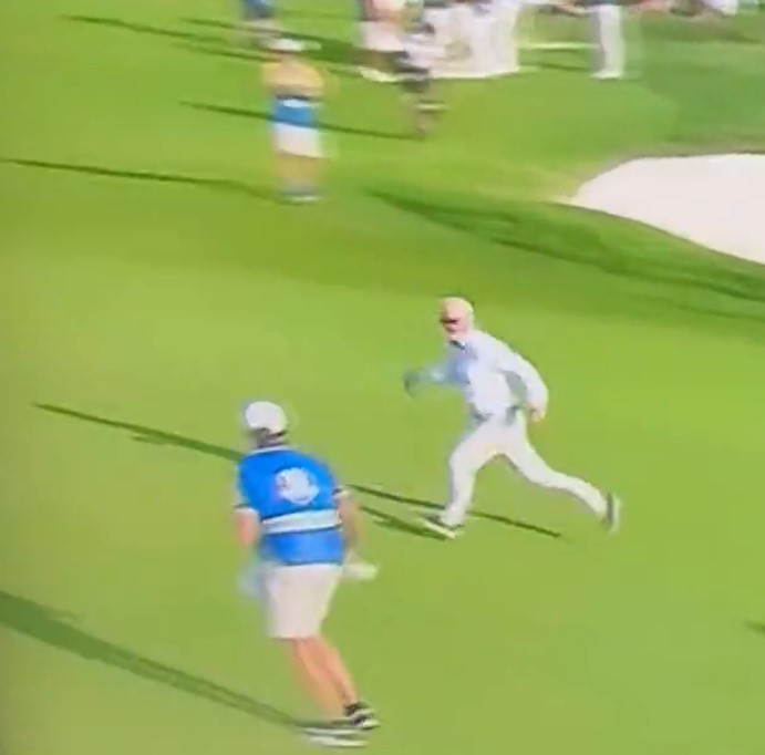 A fan sprinted across the green after Europe reclaimed the Ryder Cup