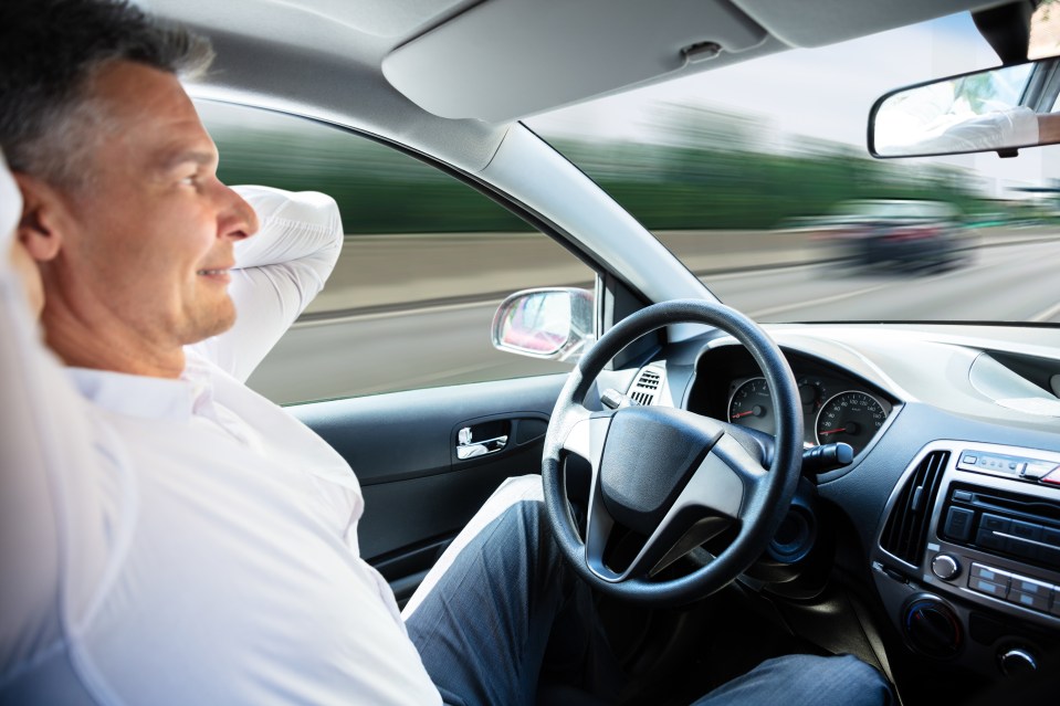 Close-up Of A Man Sitting In Self Driving Car