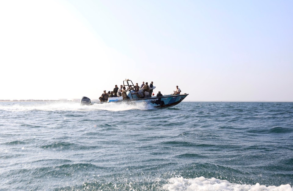 A boat carrying Houthi fighters sails close to Hodeidah, Yemen