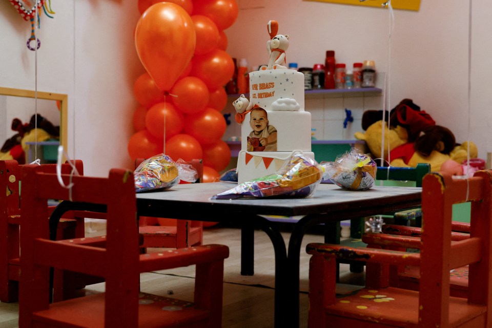 Birthday cake for Kfir Bibas, a hostage in Gaza, displayed at a kindergarten.