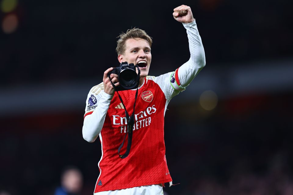 Martin Odegaard celebrated the win by taking pictures