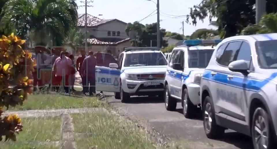 Cop cars at the scene in Trinidad