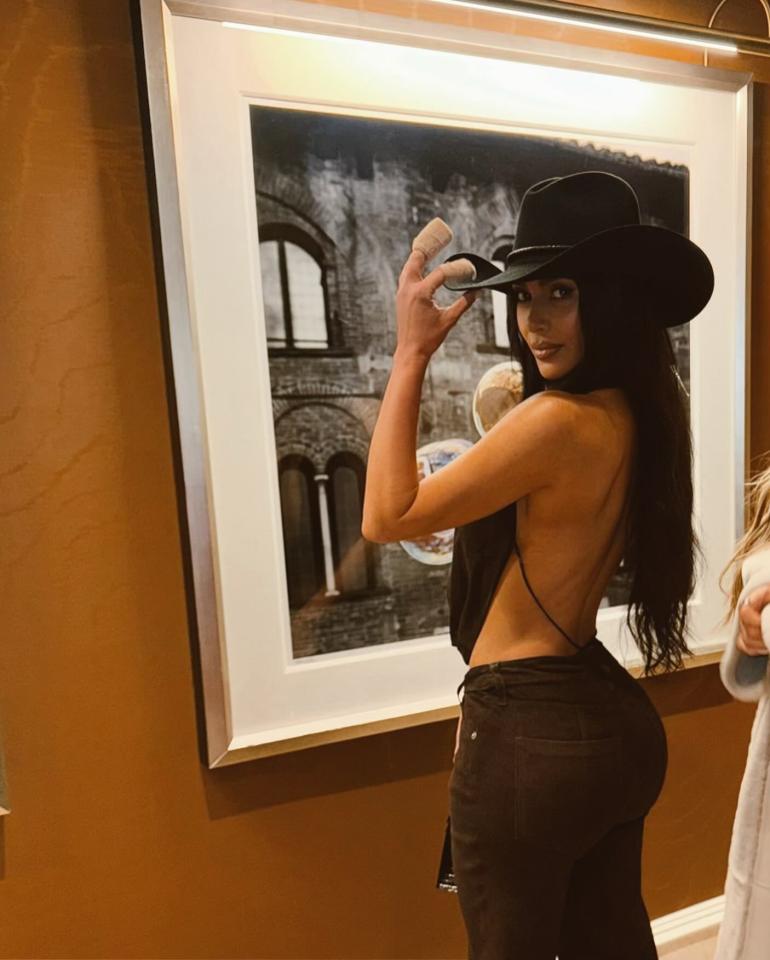 YEE-NAH Kim Kardashian flaunts her cleavage in plunging top and cowboy hat as fans accuse her of copying Beyonce. Taken Without Permission. http://www.instagram.com/p/C3TUotASSEV/?hl=en&img_index=7