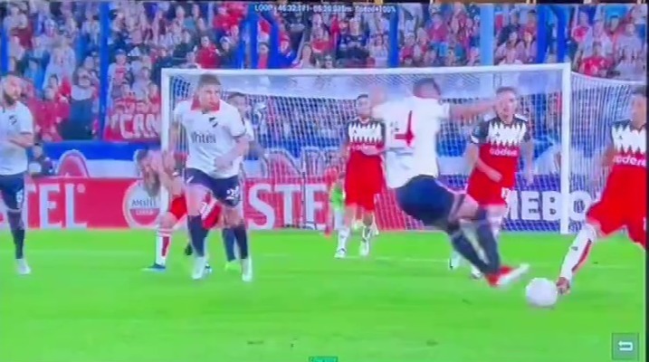 A ref failed to produce a red card for a shocking tackle during a fiery South American match