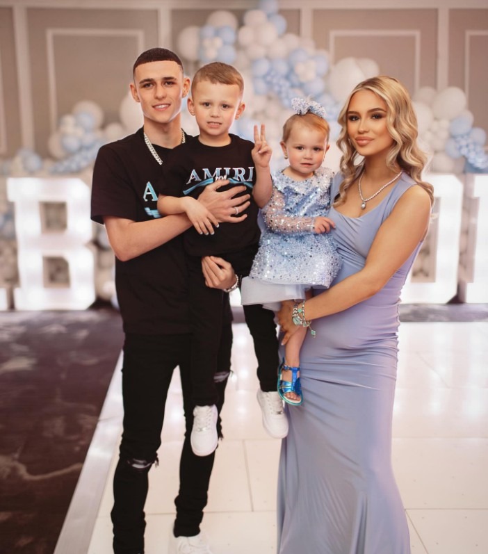 , **TAKEN WITHOUT PERMISSION**, , http://www.instagram.com/p/C6EgtR5ohpI/?igsh=MWk4M3gzMWlmNHl1OA%3D%3D, ,  Manchester City star Phil Foden and partner Becca were celebrating a hat trick off the pitch at the weekend - with a sweet baby shower to prepare for the third tot's arrival., , Blues favourite Phil and Becca are already parents to baby son Ronnie, 4, and daughter True, 1. At the weekend the parents celebrated their next arrival - with a stunning blue themed baby shower., , While Phil is known for his prowess at Manchester City, the Stockport-born-and-raised couple decided to keep it home-grown for their celebrations., , , For the couple booked out a suite at Stockport County to hold the adorable baby shower on Sunday. County, of course, are in the midst of their own celebrations after securing promotion to League One as League Two champions this season.
