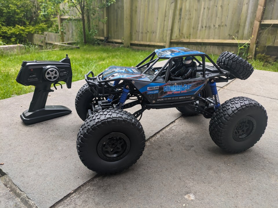 Remote control dune buggy with controller.
