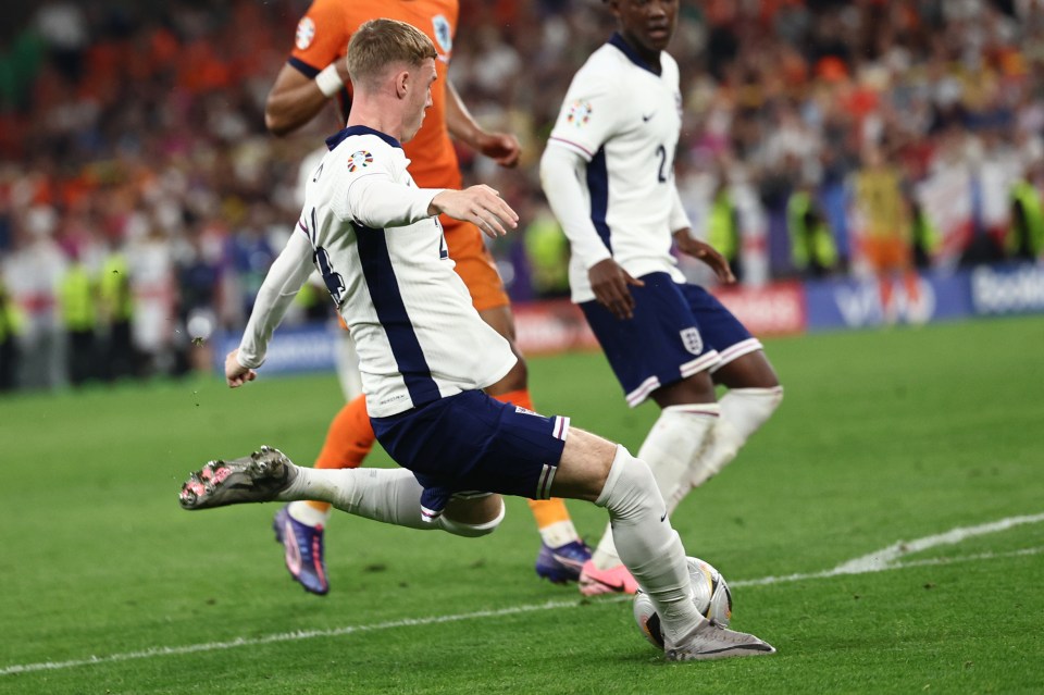 a soccer player with the number 2 on his jersey