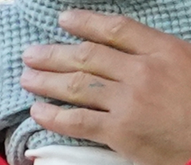 Walker has K inked on his wedding finger