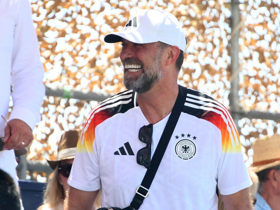 a man wearing a shirt that says ' germany ' on it