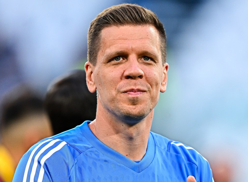 a man wearing a blue jeep jersey applauds