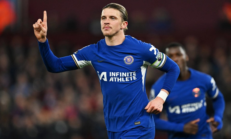 a soccer player wearing a blue jersey that says infinite athlete