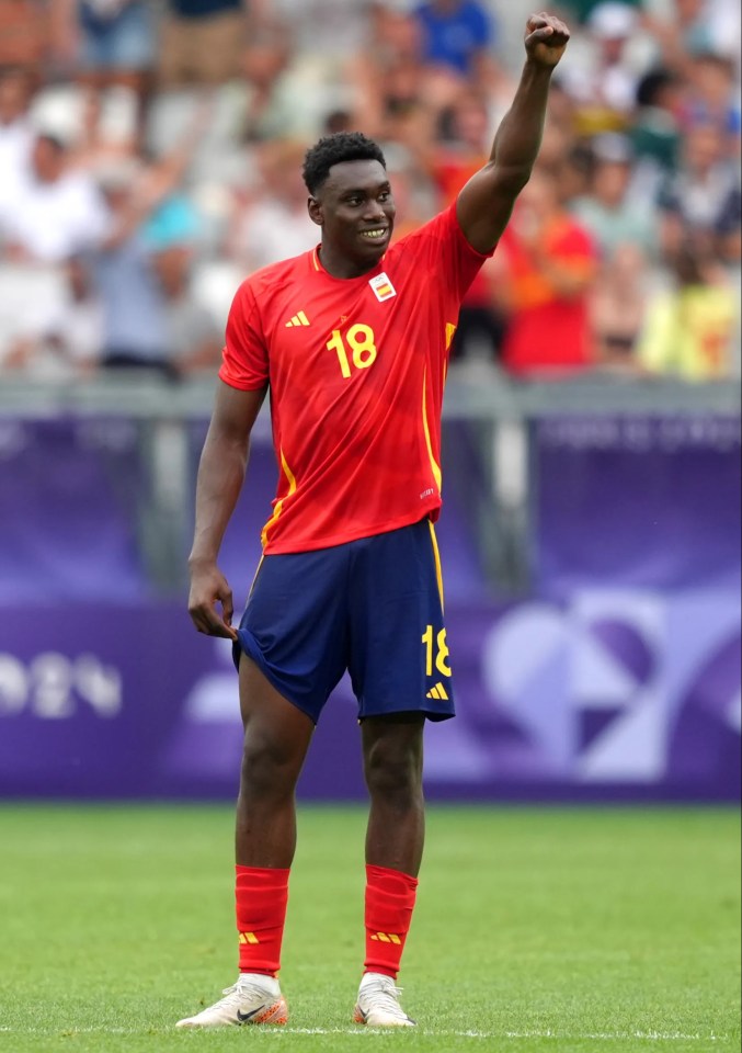 a soccer player with the number 18 on his jersey