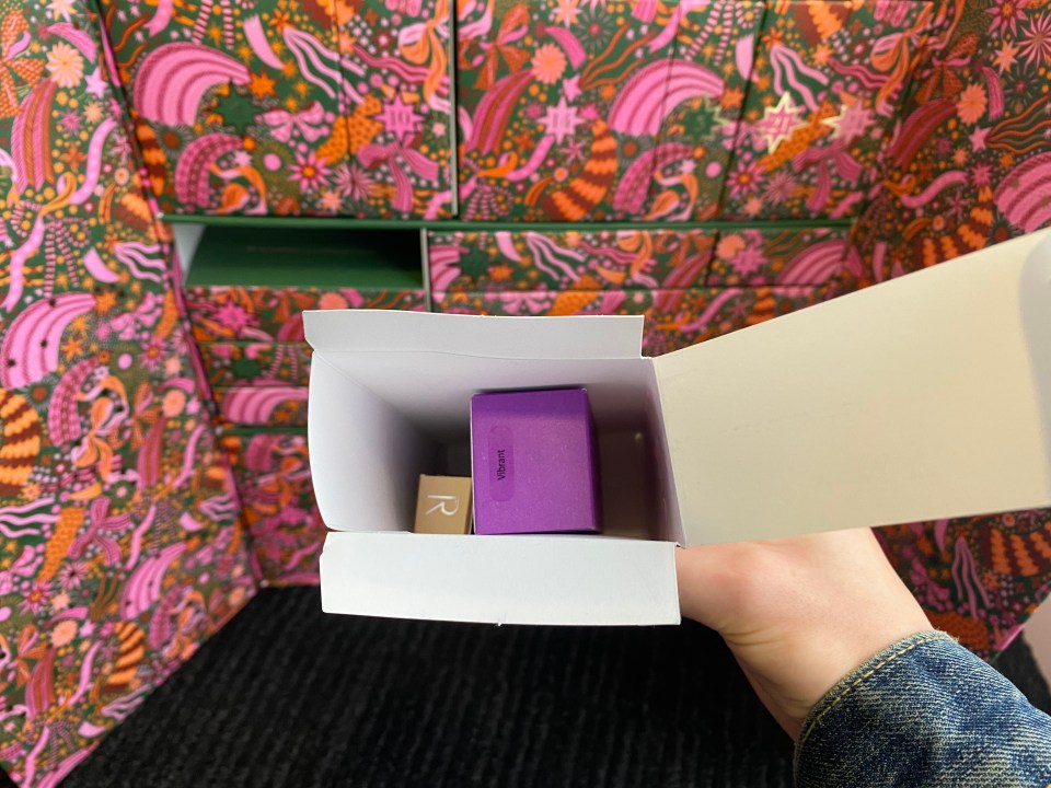 a person is holding a box that says velvet on it