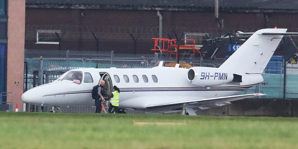 a small plane with the letters sh-pmn on the tail