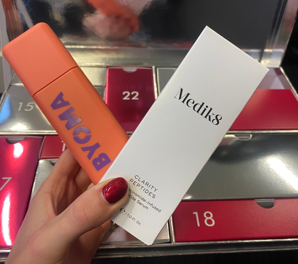 a bottle of byoma next to a box of medik8