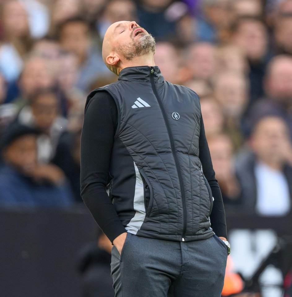 a man wearing an adidas vest looks up at the sky