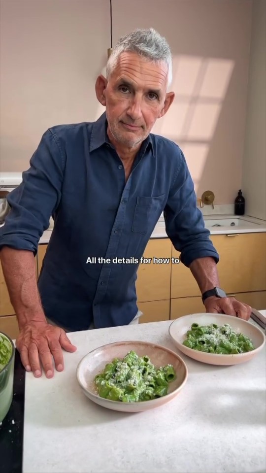a man in a blue shirt stands in front of two plates of pasta and says " all the details for how to "