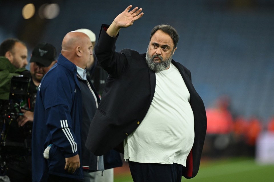 Olympiakos president Evangelos Marinakis gestures to fans on the pitch after the UEFA Europa Conference League semi final first leg football match between Aston Villa and Olympiakos at Villa Park in Birmingham, central England, on May 2, 2024. (Photo by JUSTIN TALLIS / AFP) (Photo by JUSTIN TALLIS/AFP via Getty Images)