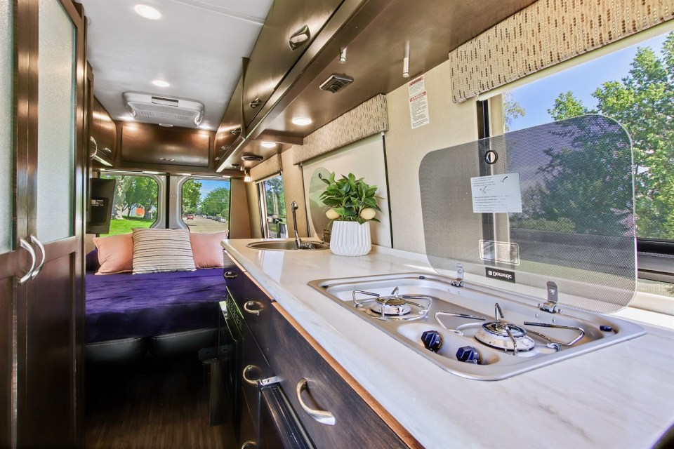 a kitchen with a dometic stove top oven